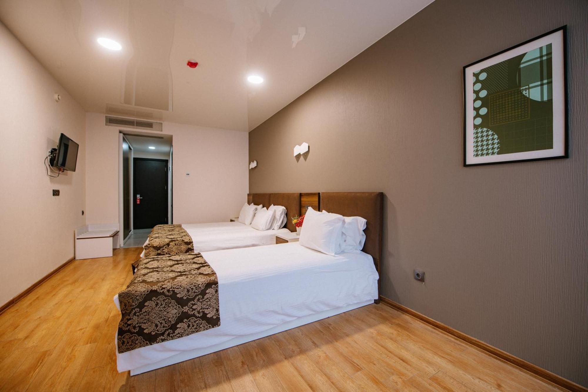 Iveria Inn Hotel Tbilisi Rom bilde