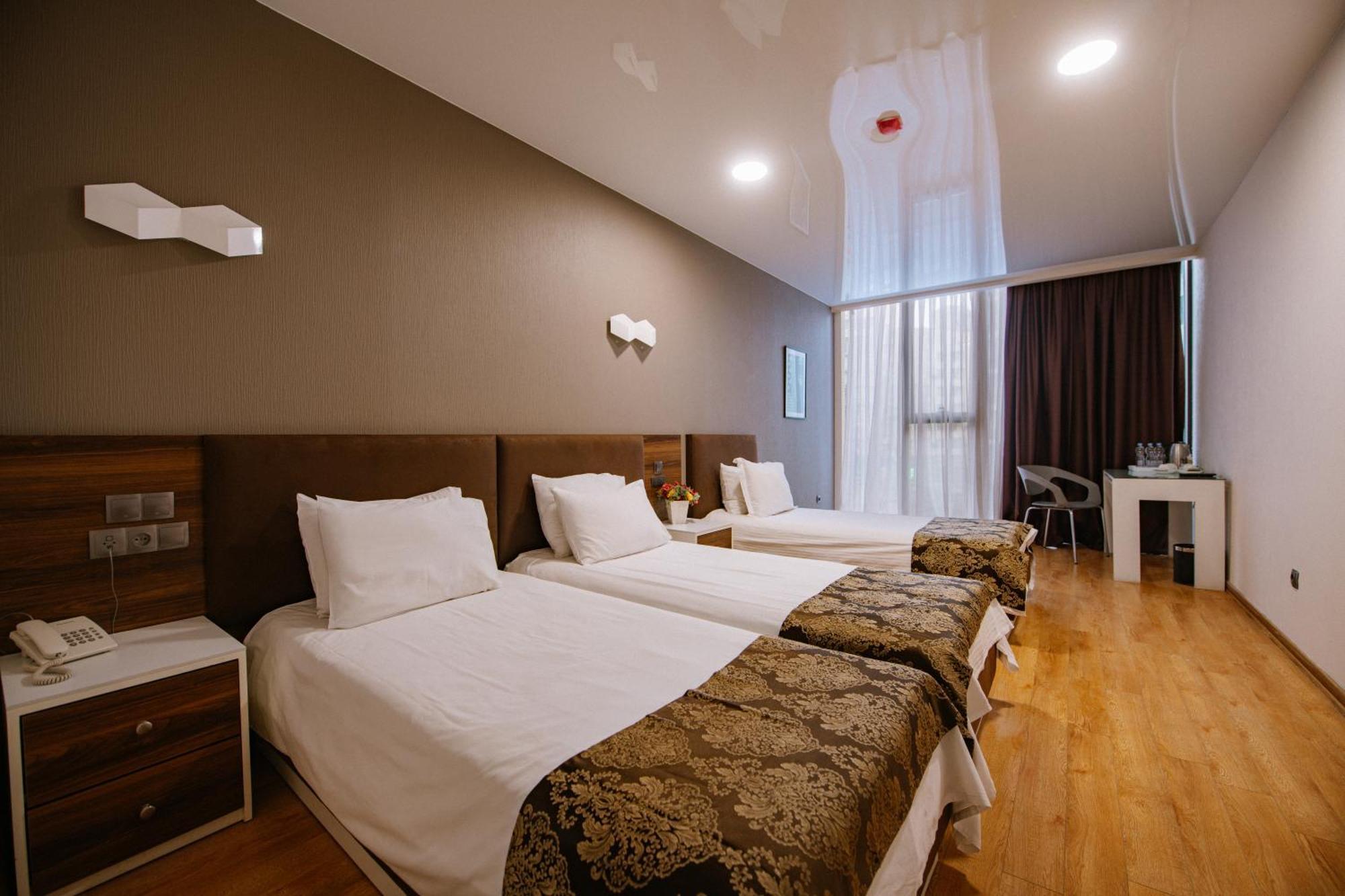Iveria Inn Hotel Tbilisi Rom bilde
