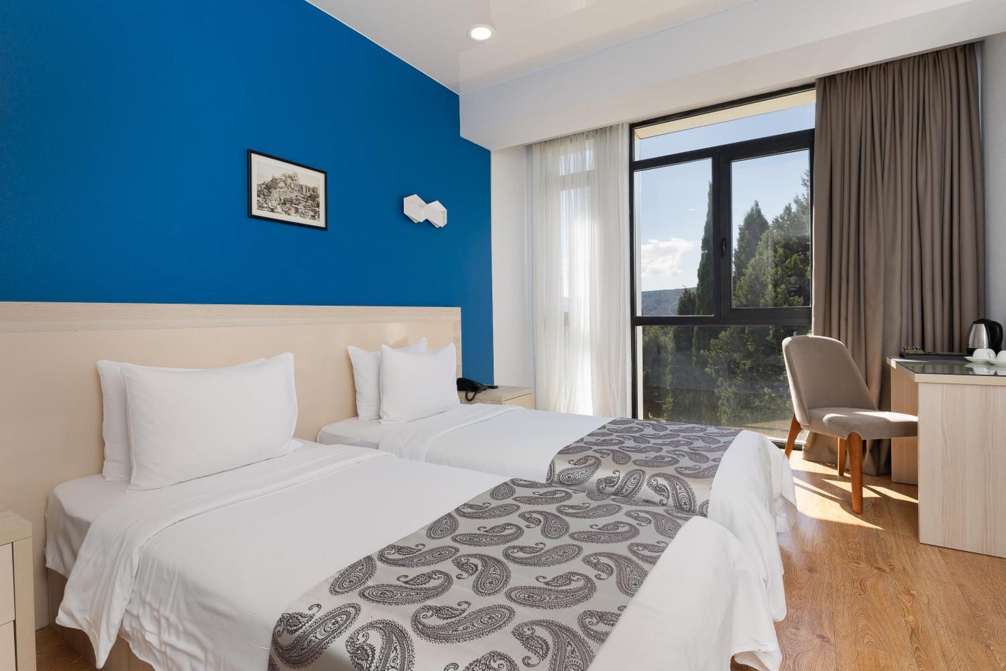 Iveria Inn Hotel Tbilisi Rom bilde